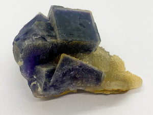 Purple Sugar Cube Fluorite on Druzy Quartz