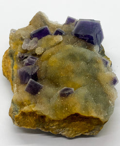 Purple Sugar Cube Fluorite on Druzy Quartz