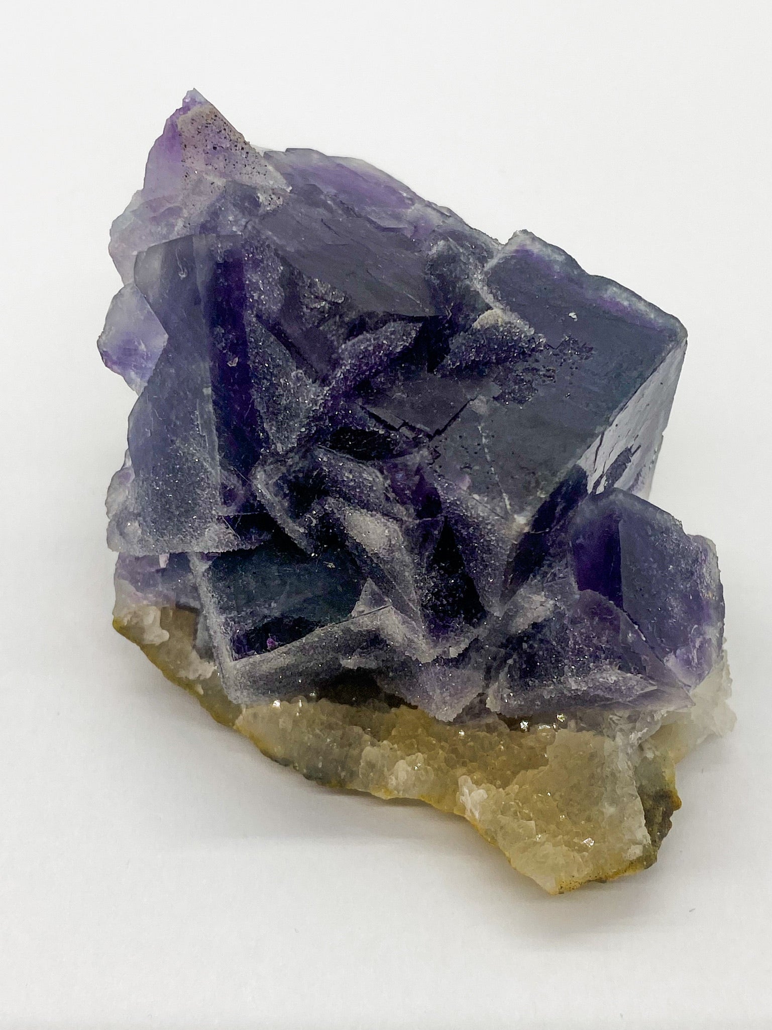 Purple Sugar Cube Fluorite on Druzy Quartz