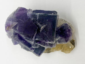 Purple Sugar Cube Fluorite on Druzy Quartz