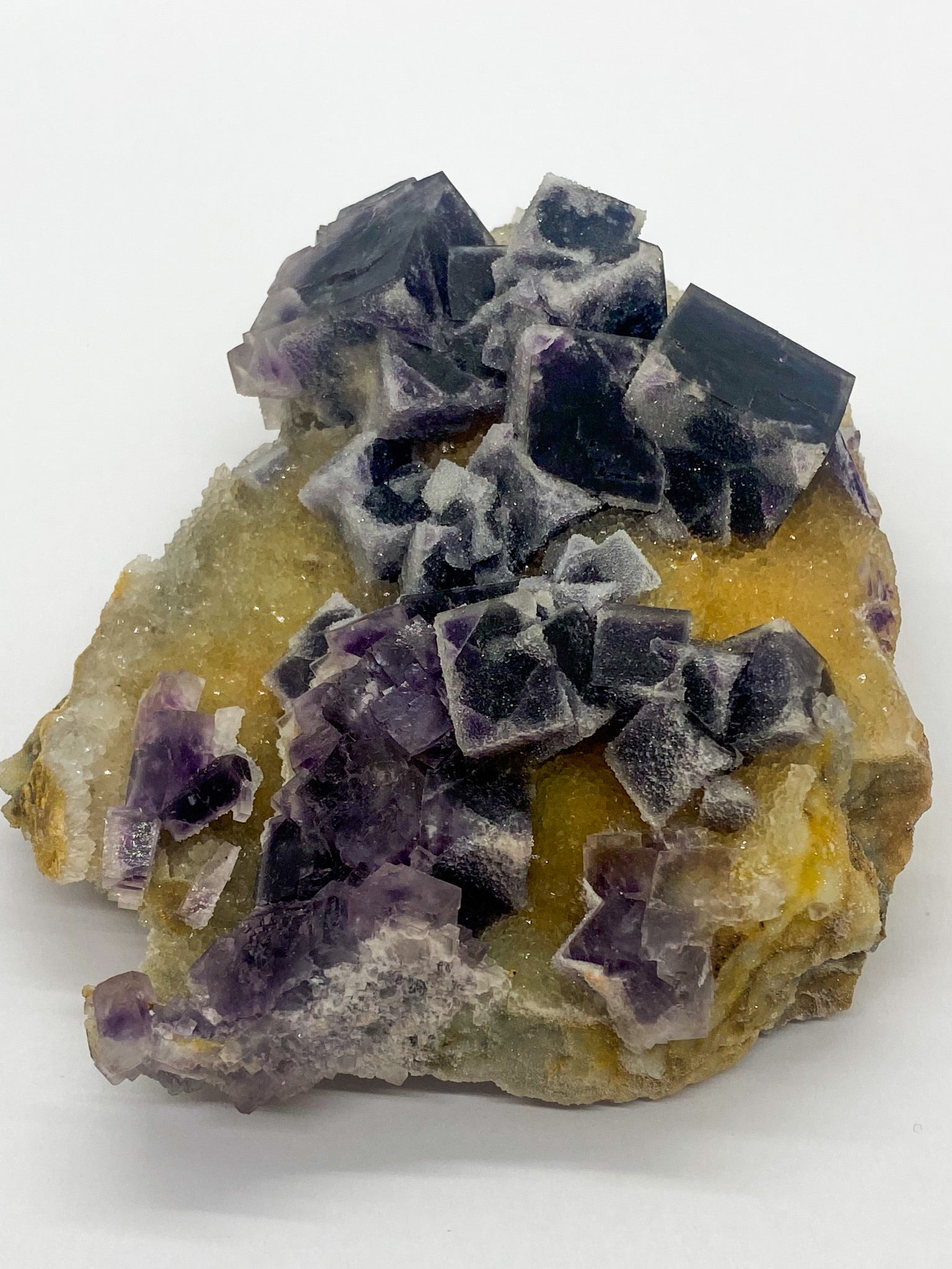 Purple Sugar Cube Fluorite on Druzy Quartz