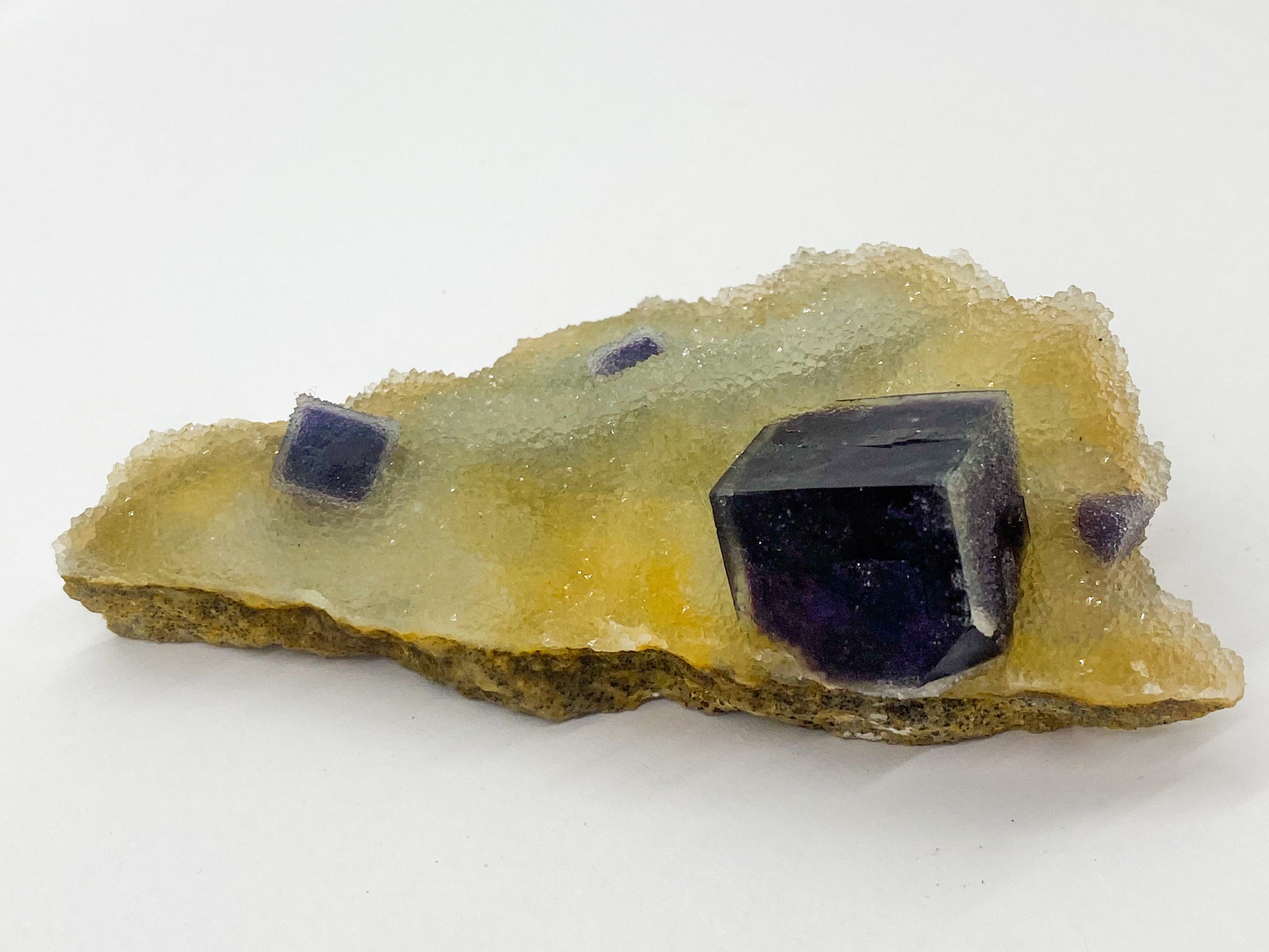 Purple Sugar Cube Fluorite on Druzy Quartz