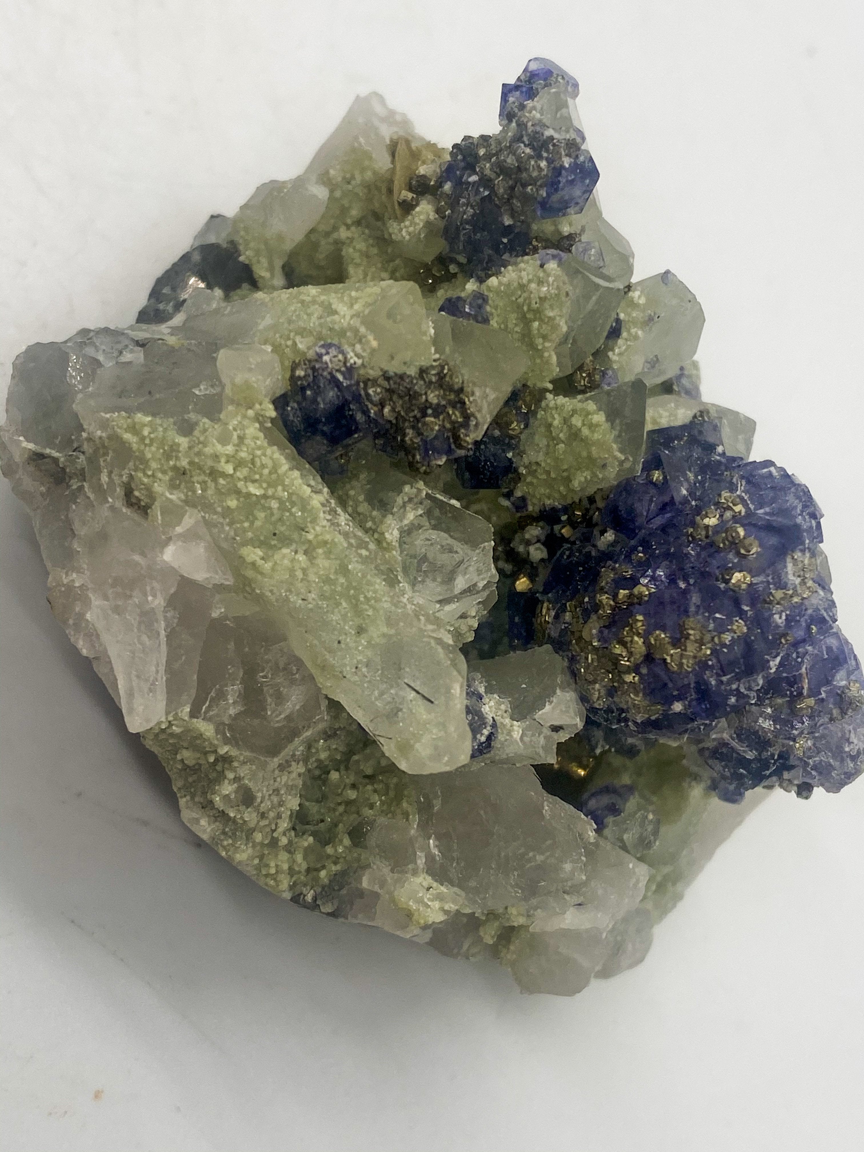 Purple Tanzanite on Quartz with Muscovite and Pyrite