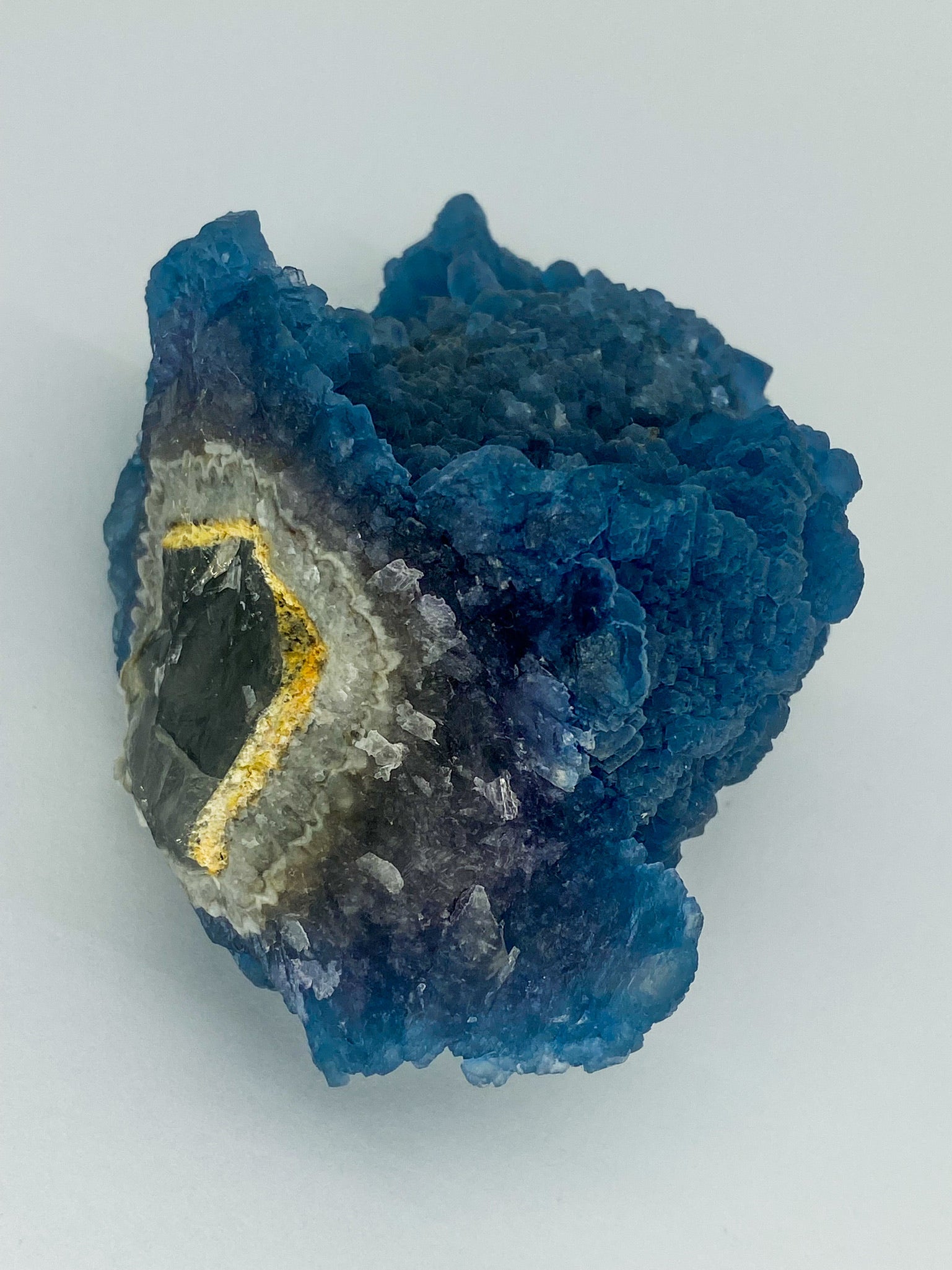 Blue Step Fluorite on Candle Quartz