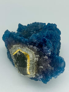 Blue Step Fluorite on Candle Quartz