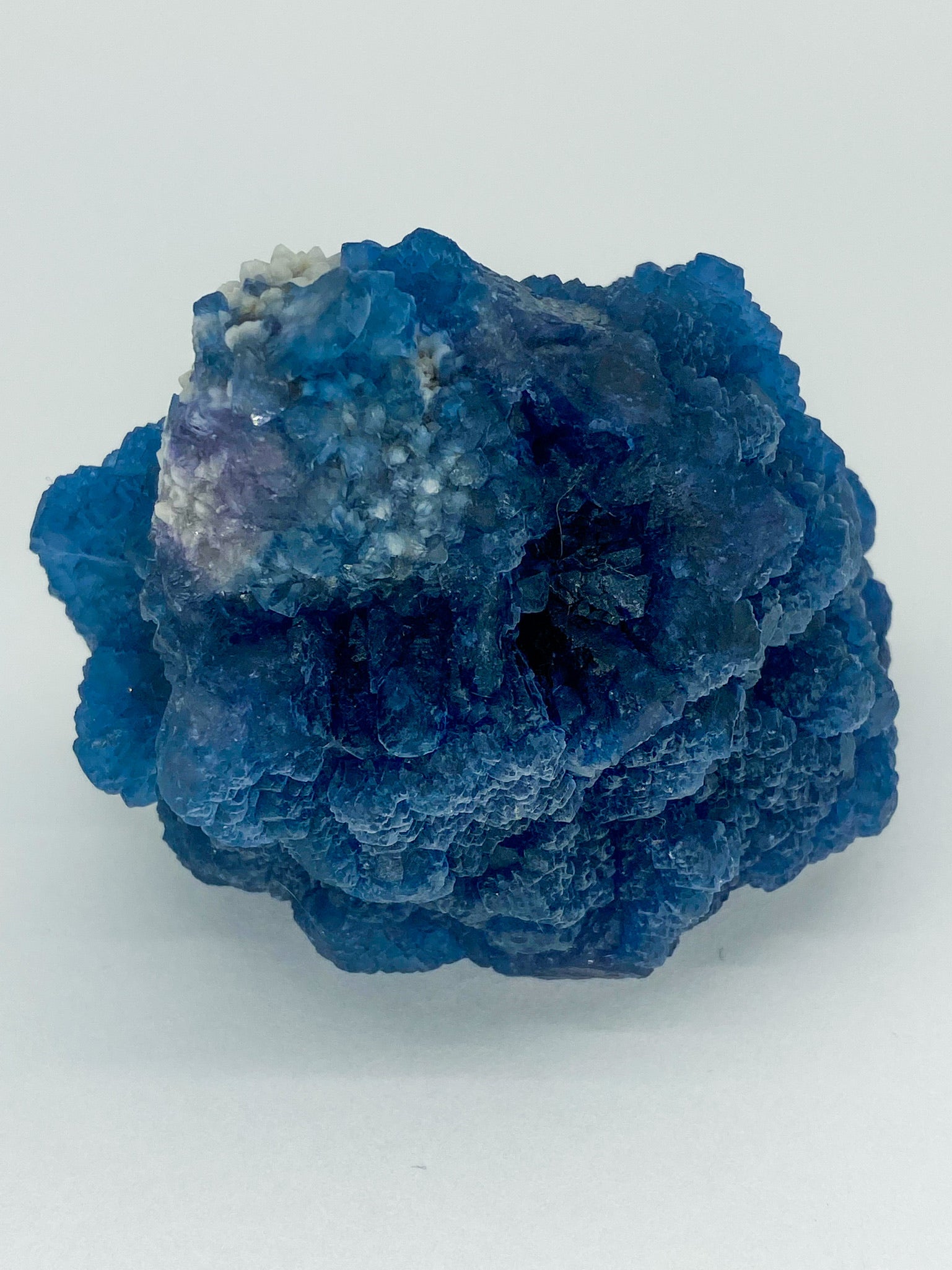 Blue Step Fluorite on Candle Quartz