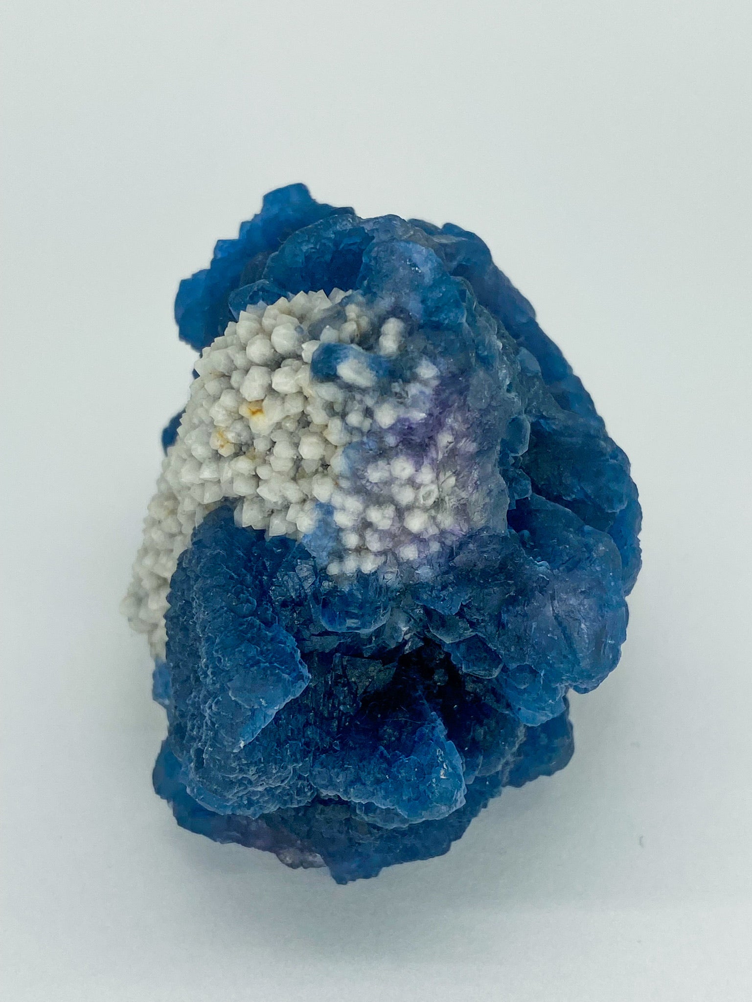 Blue Step Fluorite on Candle Quartz