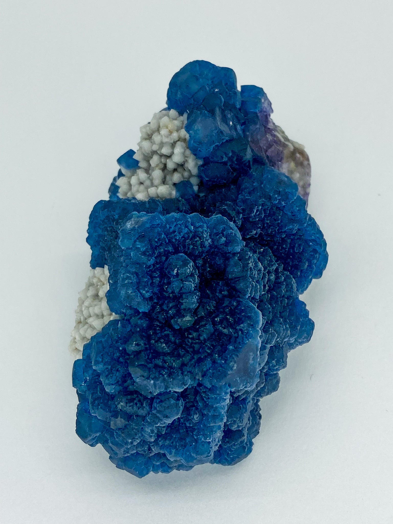 Blue Step Fluorite on Candle Quartz