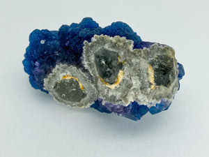 Blue Step Fluorite on Candle Quartz