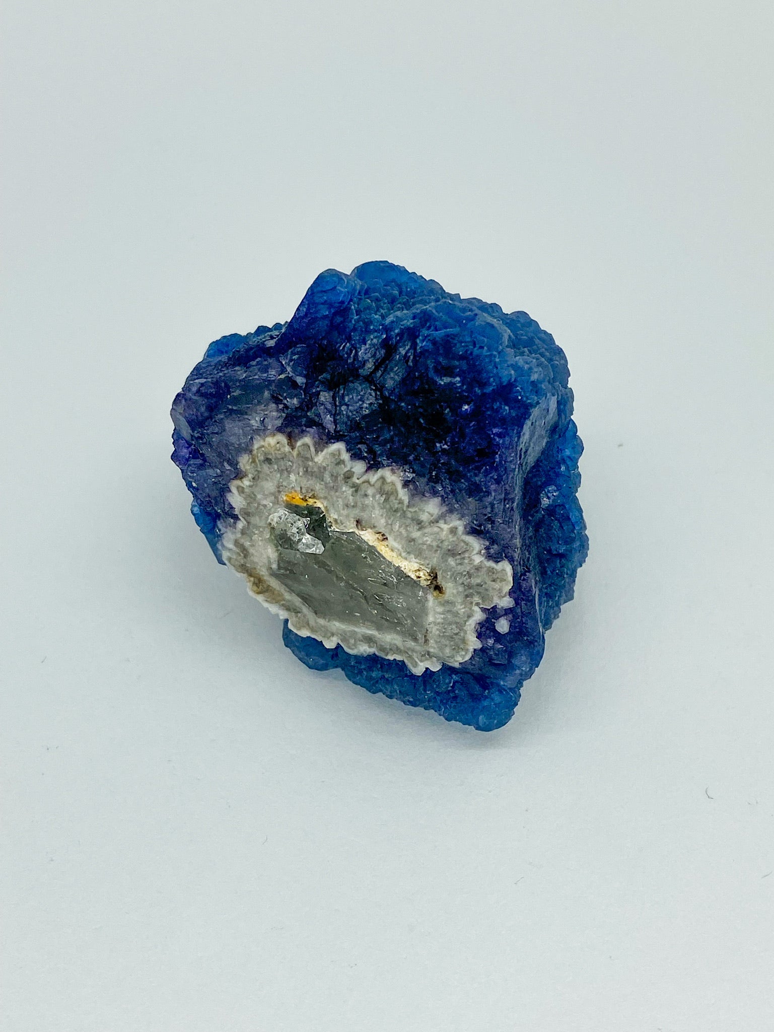 Blue Step Fluorite on Candle Quartz