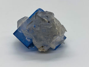 Blue Fluorite cube with calcite flower